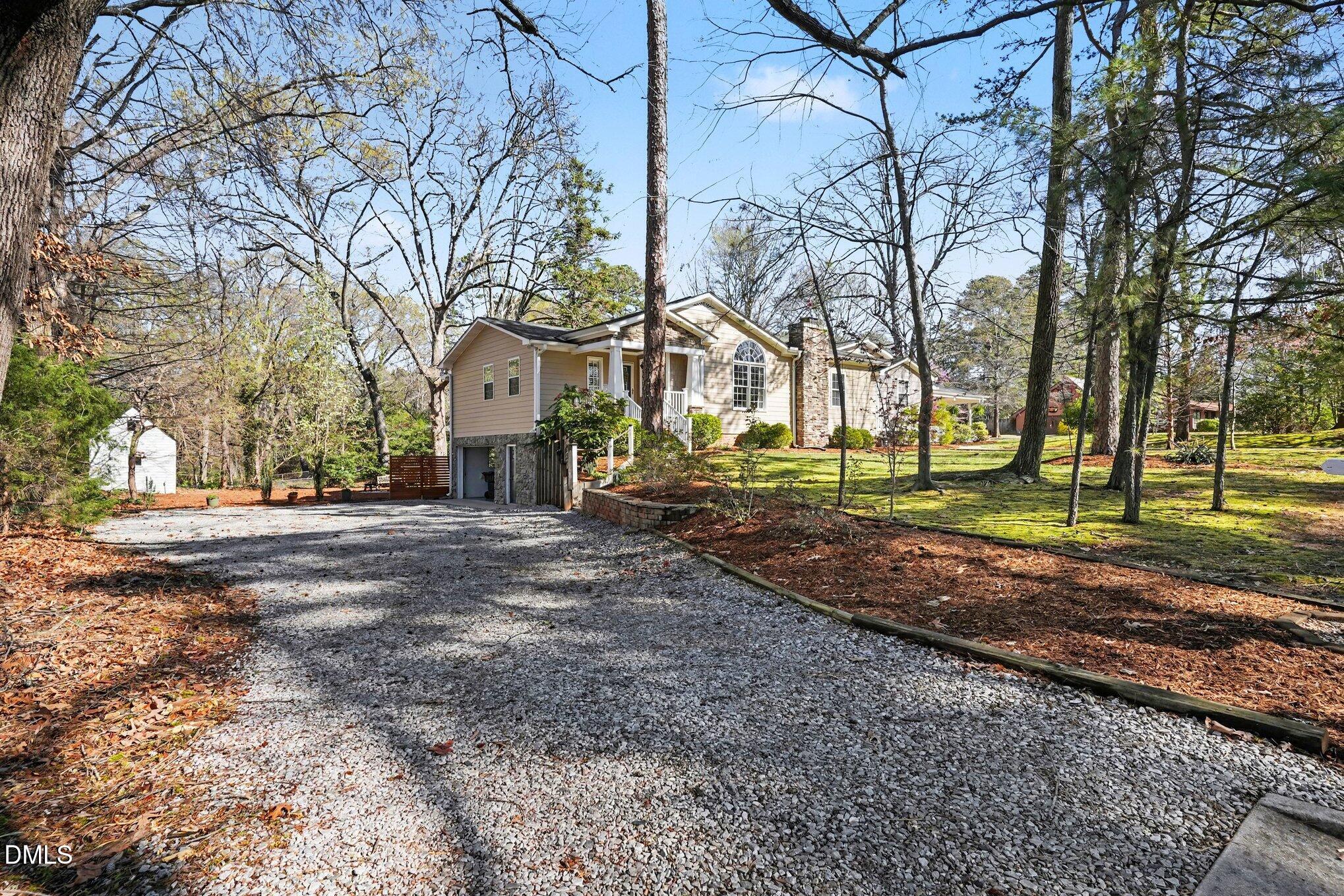3400 Octavia Street Raleigh, NC 27606 - Photo 4 of 36 a view of road with large trees