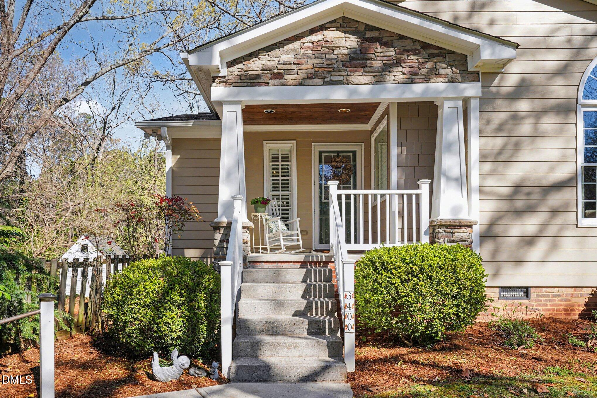 3400 Octavia Street Raleigh, NC 27606 - Photo 5 of 36 a view of a house with a small garden