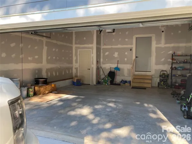 a view of room with a furniture and fireplace