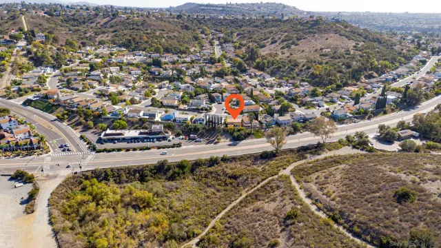 a view of an outdoor space with lots of windows