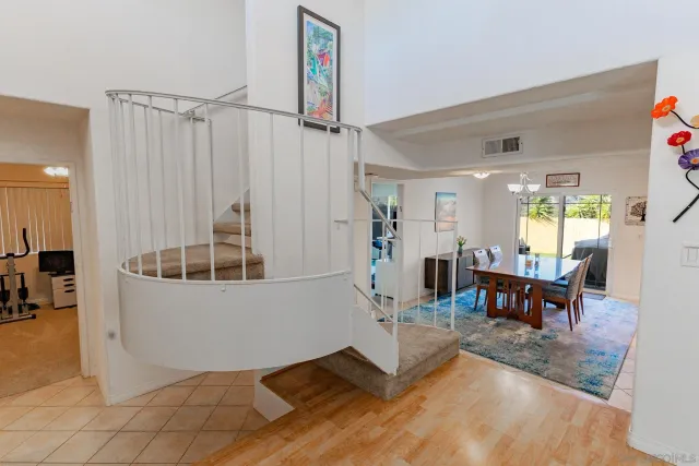 a view of multiple houses with a street