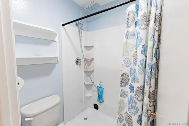 a kitchen with a stove and a refrigerator