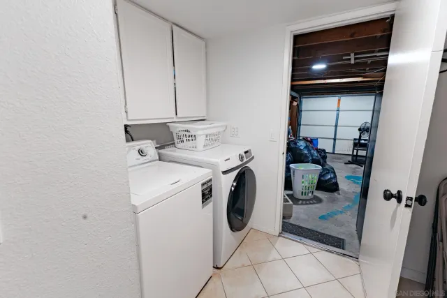 a bathroom with a glass shower door and a bathtub