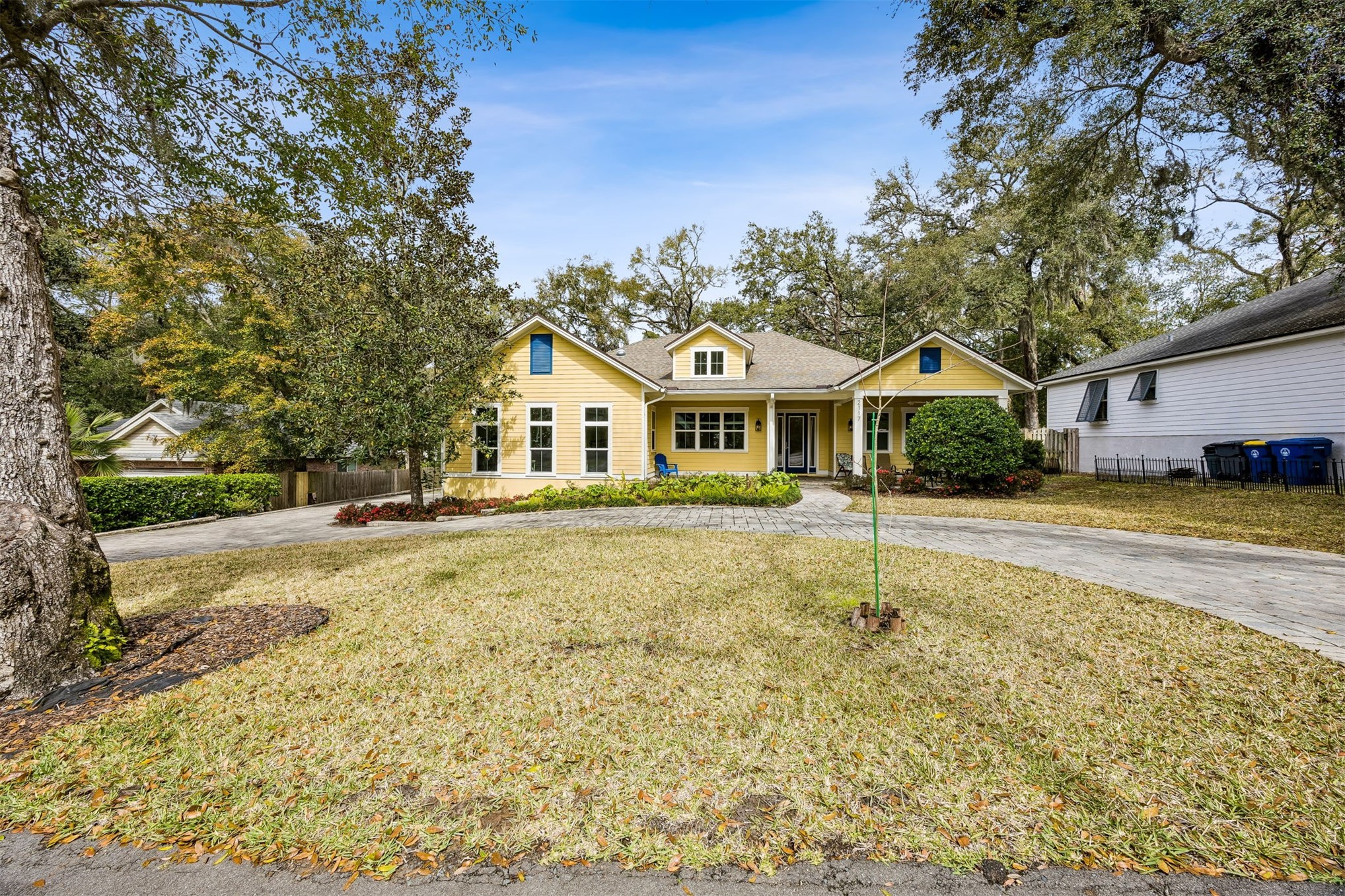 2117 Alachua Street Fernandina Beach, FL 32034 - Photo 1 of 52 a front view of a house with a yard