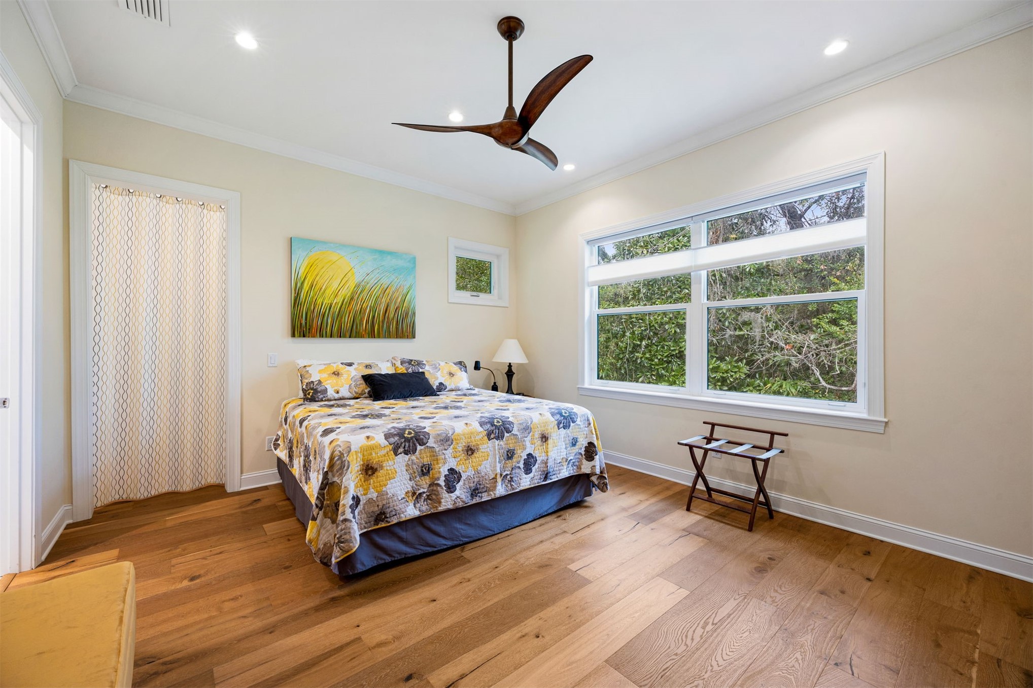 2117 Alachua Street Fernandina Beach, FL 32034 - Photo 29 of 52 a bed sitting in a bedroom next to a window