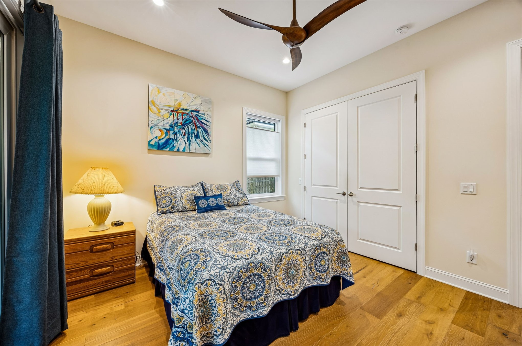 2117 Alachua Street Fernandina Beach, FL 32034 - Photo 39 of 52 a bedroom with a bed and a painting on the wall