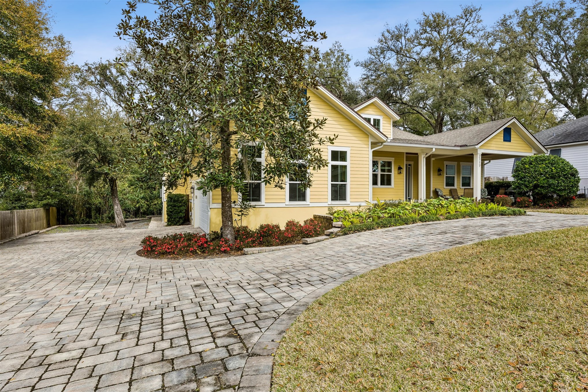 2117 Alachua Street Fernandina Beach, FL 32034 - Photo 4 of 52 a front view of a house with a yard