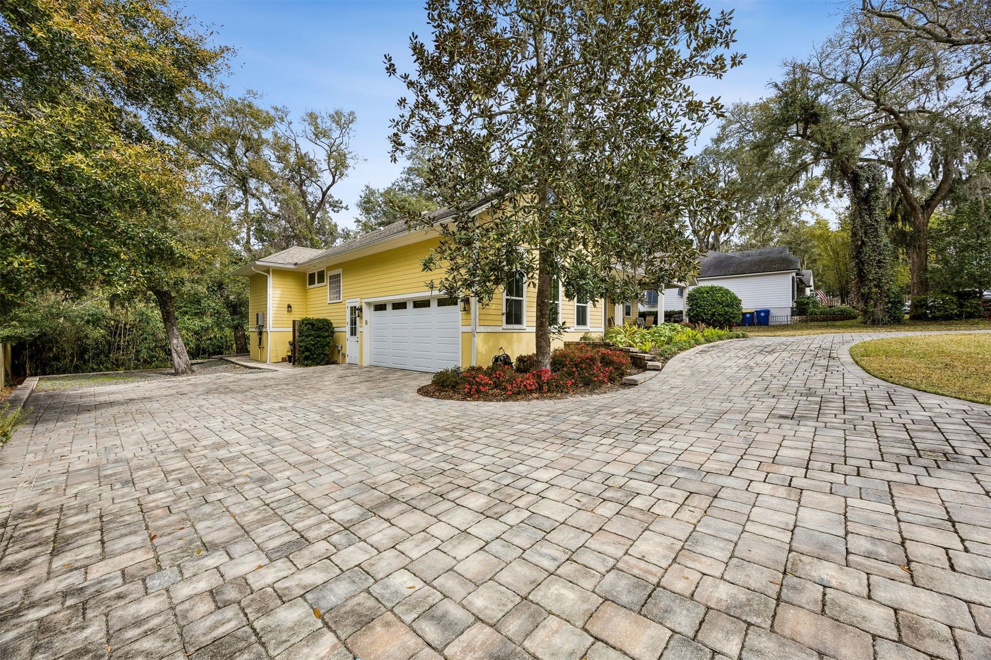 2117 Alachua Street Fernandina Beach, FL 32034 - Photo 6 of 52 a view of a house with a yard and large trees