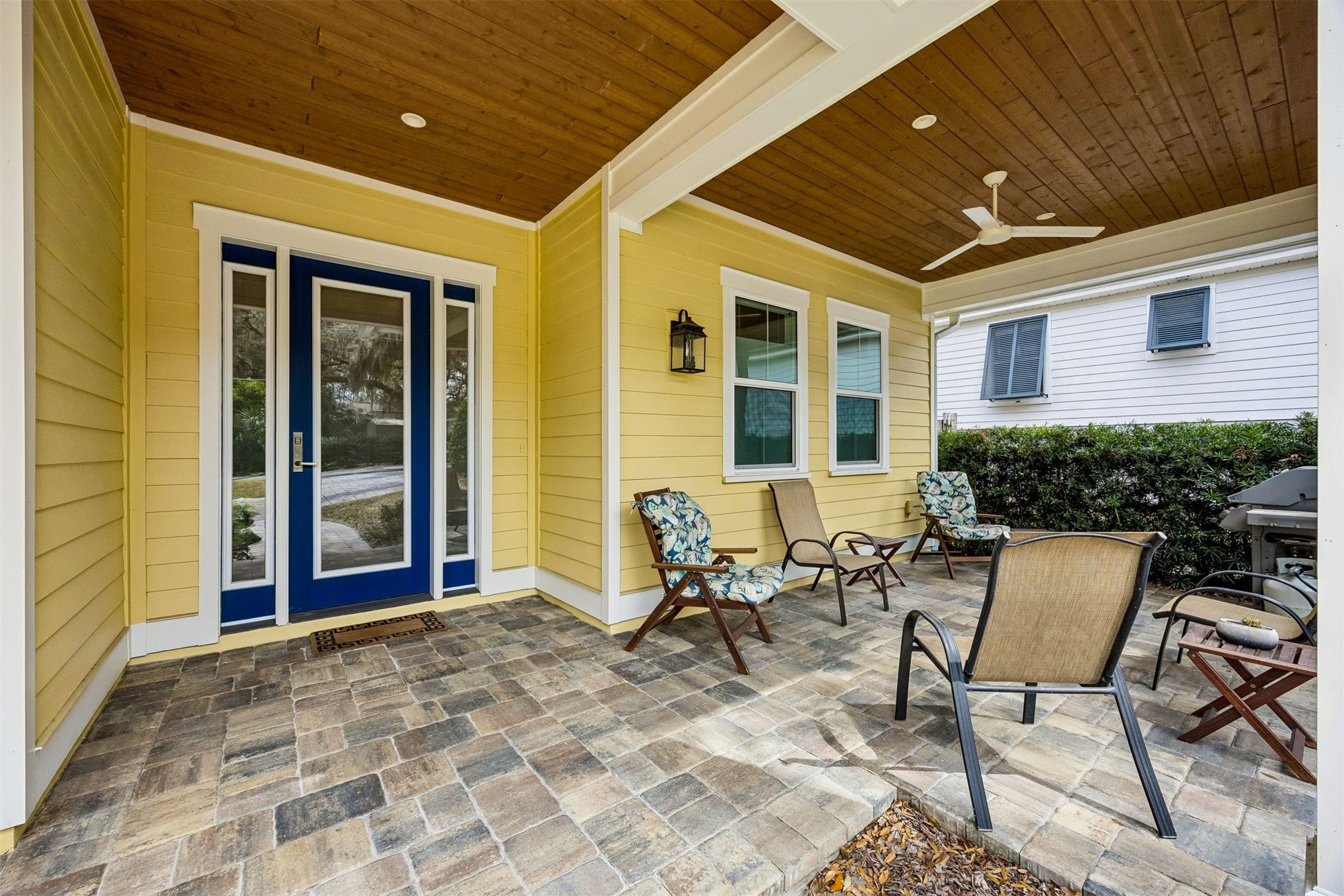 2117 Alachua Street Fernandina Beach, FL 32034 - Photo 8 of 52 a view of a patio with table and chairs near a barbeque