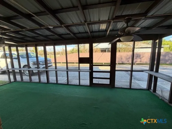 a view of yard with porch