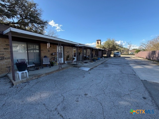 508 East Travis Street Luling, TX 78648 - Photo 17 of 17 a view of a street with houses