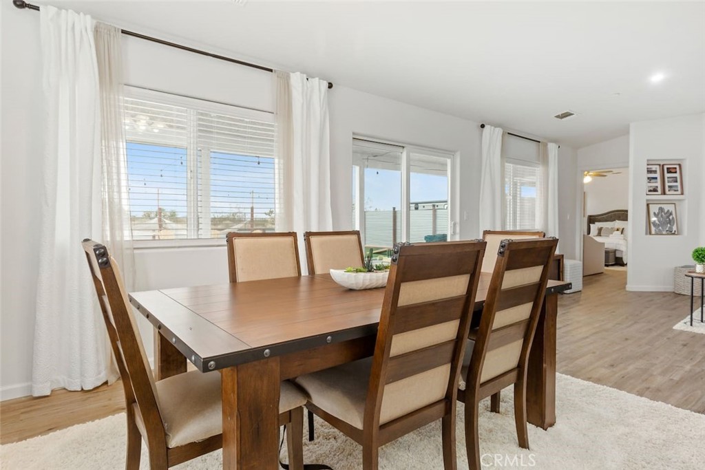 62382 Crestview Drive Joshua Tree, CA 92252 - Photo 15 of 31 a view of a dining room with furniture and window