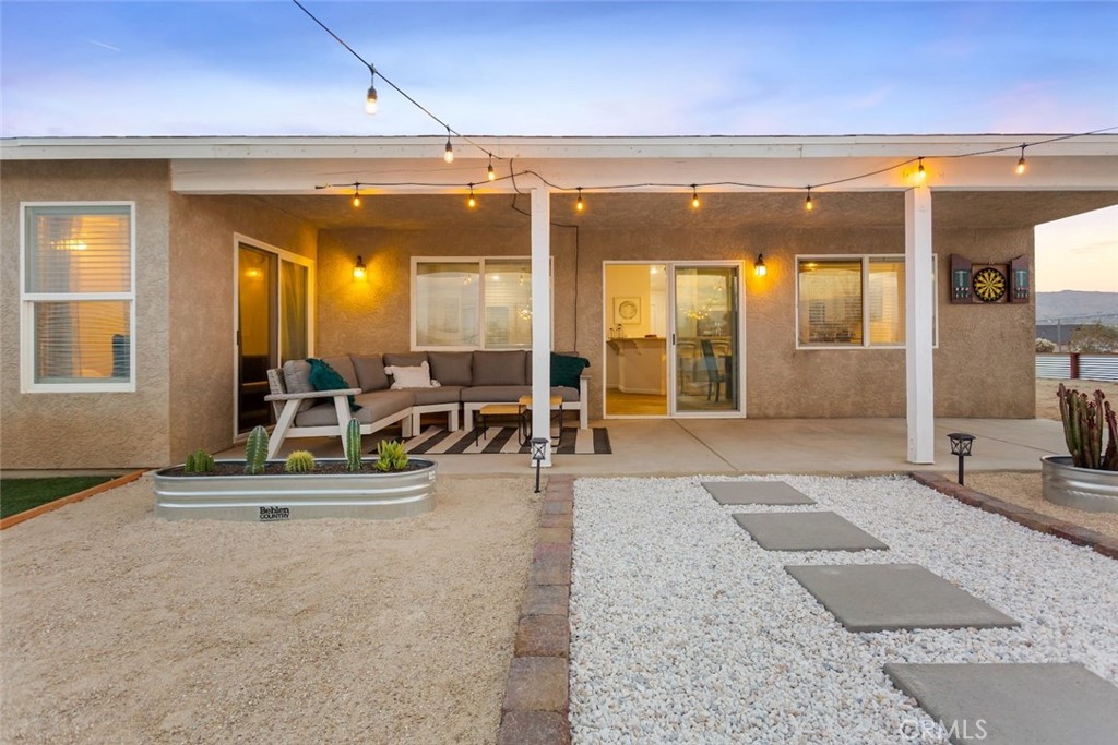 62382 Crestview Drive Joshua Tree, CA 92252 - Photo 24 of 31 a view of a hall with dining area