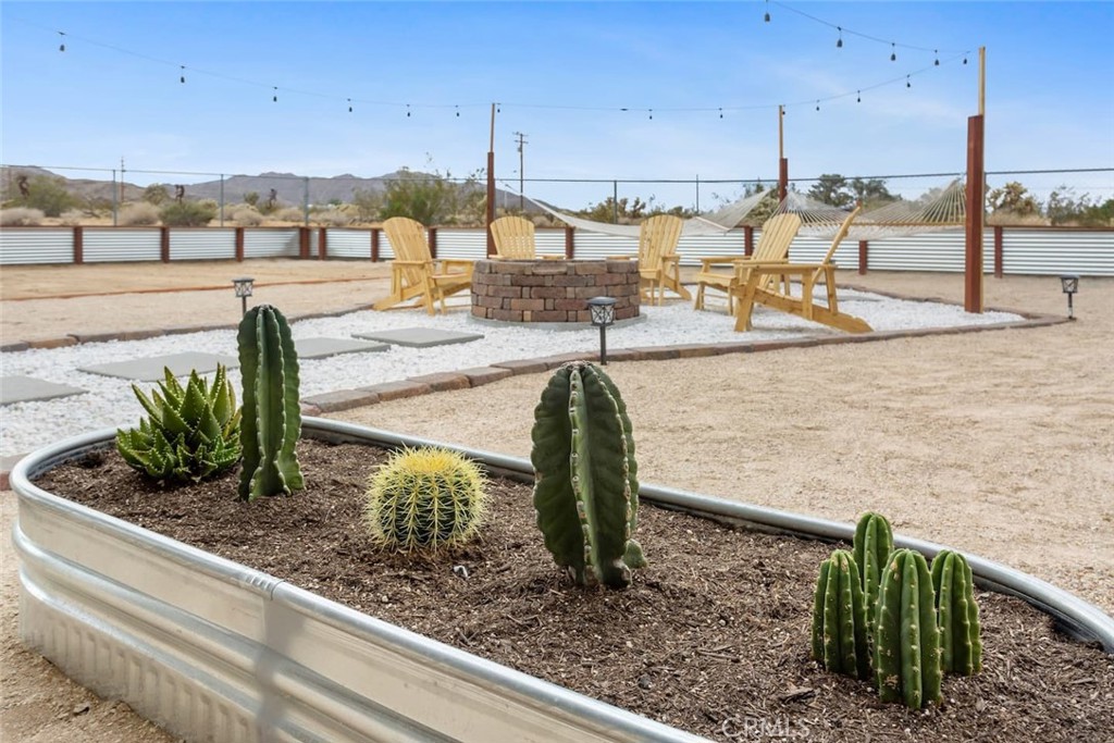 62382 Crestview Drive Joshua Tree, CA 92252 - Photo 28 of 31 a view of a terrace with wooden floor