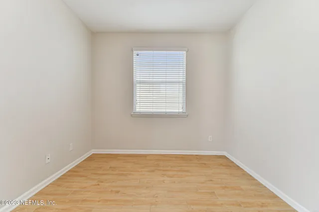 a bathroom with a sink double vanity and a mirror