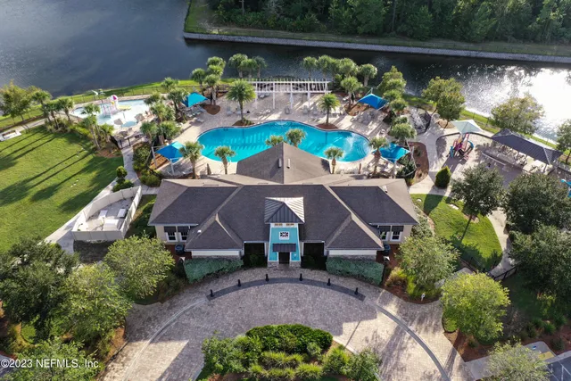 a front view of a building with garden