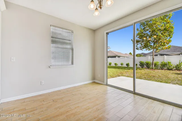 a view of kitchen with wooden floor