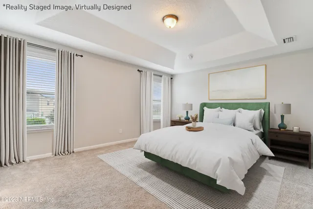 a bathroom with a granite countertop sink a toilet and a bathtub