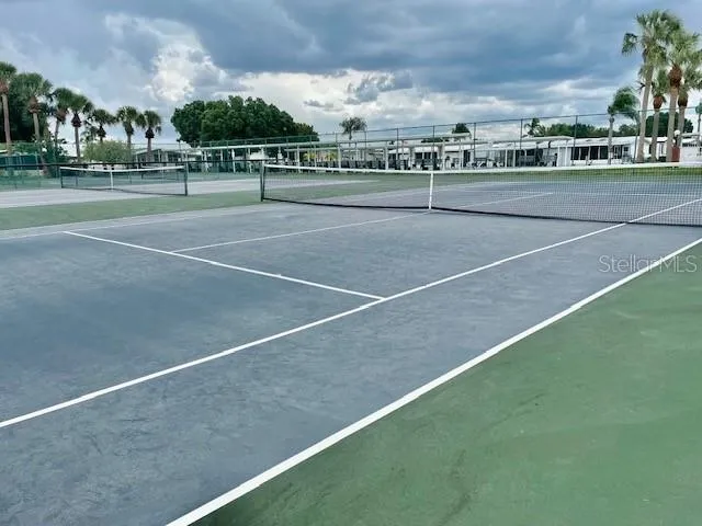 a view of a house with a yard and plants