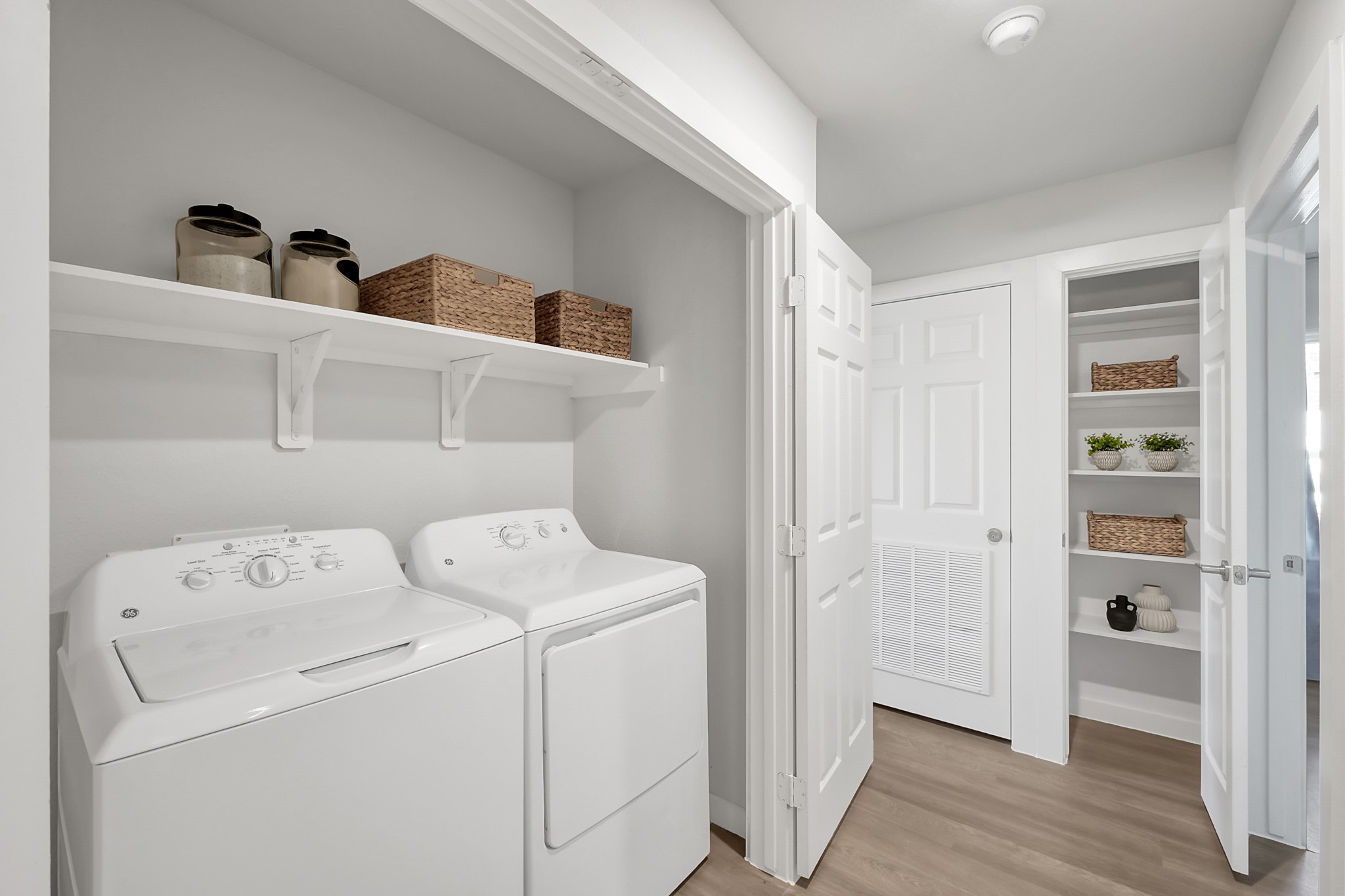 3450 Barker Cypress Road, Unit 2201 Houston, TX 77084 - Photo 13 of 17 a view of storage and utility room with washer and dryer