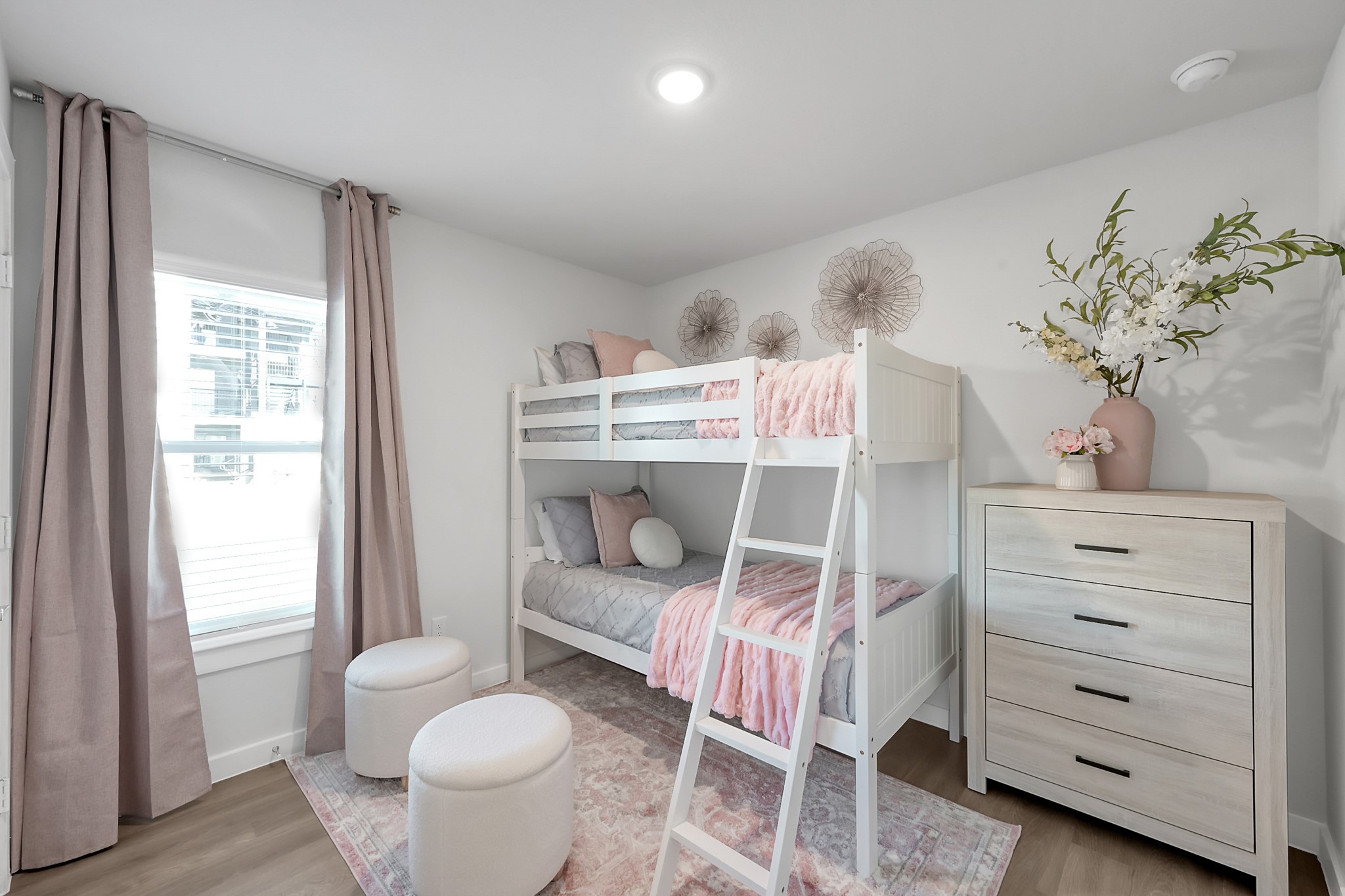 3450 Barker Cypress Road, Unit 2201 Houston, TX 77084 - Photo 10 of 17 a bedroom with a bed and a chair