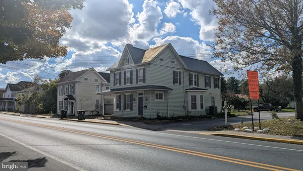 a view of a building with a street