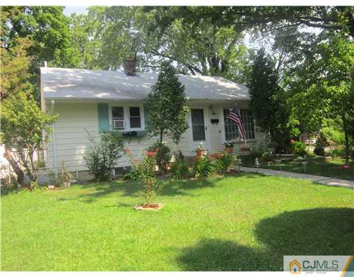 2 Cannon Road East Brunswick, NJ 08816 - Photo 2 of 17 a view of a house with a yard and sitting area