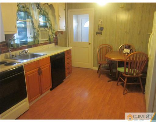 2 Cannon Road East Brunswick, NJ 08816 - Photo 13 of 17 a bathroom with a sink and a mirror