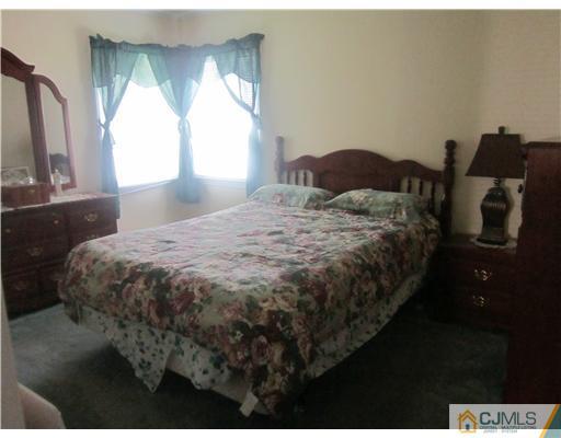 2 Cannon Road East Brunswick, NJ 08816 - Photo 14 of 17 a bedroom with a bed and window