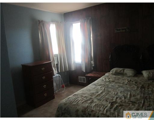2 Cannon Road East Brunswick, NJ 08816 - Photo 16 of 17 a bedroom with a bed and a window