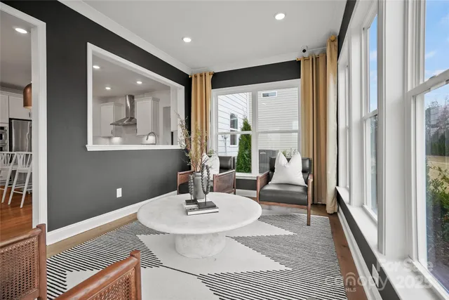 a living room with furniture and a table