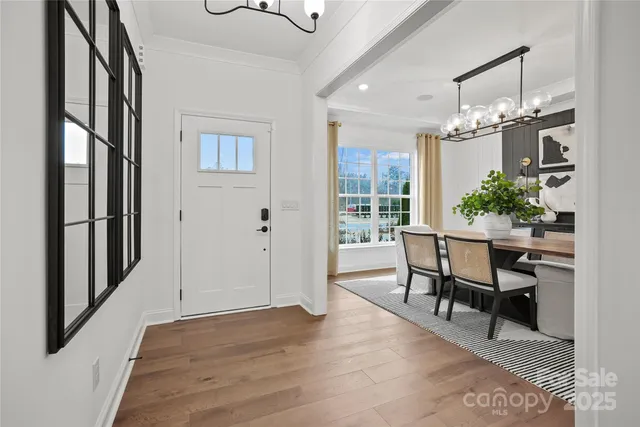 a view of a livingroom with furniture and a window