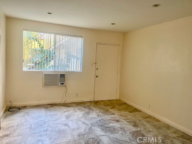 5105 Woodman Avenue, Unit 3 Sherman Oaks, CA 91423 - Photo 12 of 18 an empty room with a empty space and window