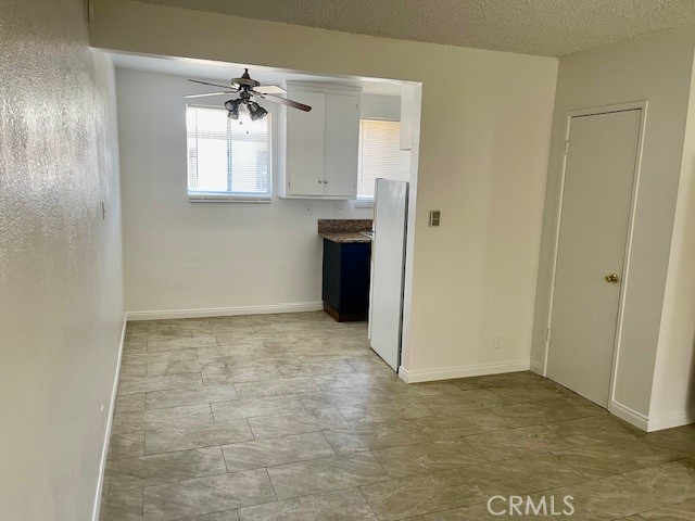 5105 Woodman Avenue, Unit 3 Sherman Oaks, CA 91423 - Photo 6 of 18 a view of an empty room with a window