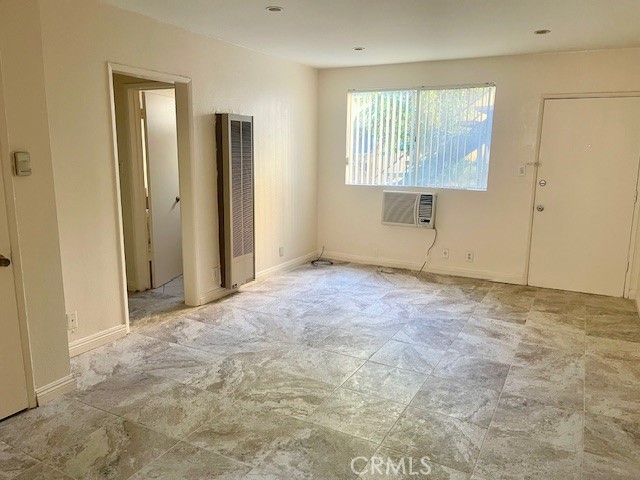 5105 Woodman Avenue, Unit 3 Sherman Oaks, CA 91423 - Photo 10 of 18 an empty room with windows