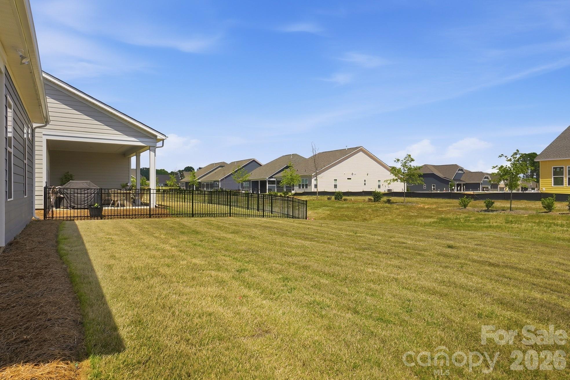 1035 Rabbit Hl Lane Monroe, NC 28110 - Photo 32 of 39 a view of swimming pool with lawn chairs and potted plants