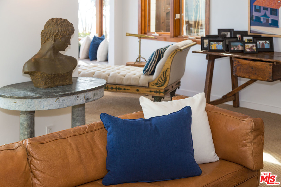 21644 Pacific Coast Highway Malibu, CA 90265 - Photo 19 of 53 a view of living room with furniture and floor to ceiling window