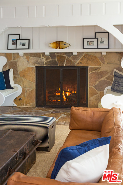 21644 Pacific Coast Highway Malibu, CA 90265 - Photo 22 of 53 a living room with furniture and lamp