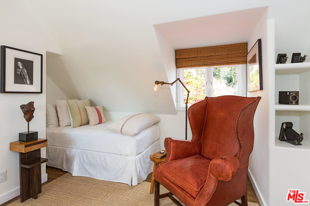 21644 Pacific Coast Highway Malibu, CA 90265 - Photo 51 of 53 a living room with furniture and a window