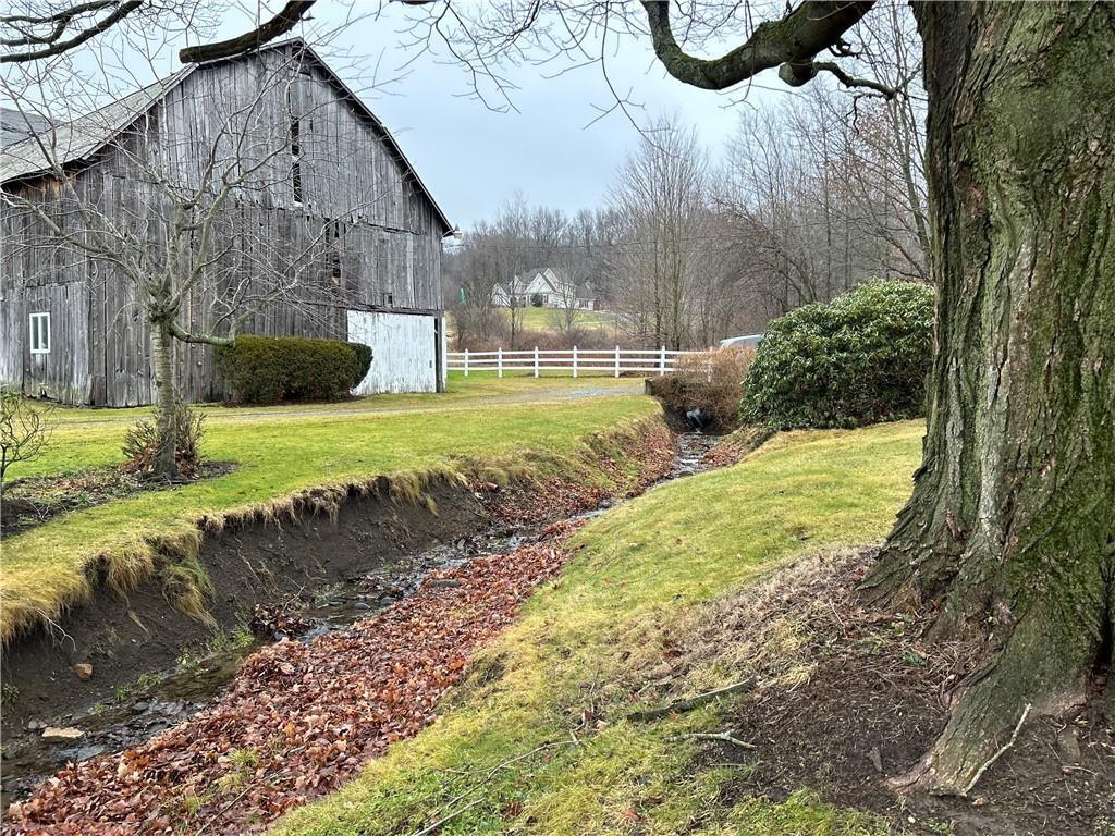 10202 Cutter Road Meadville, PA 16335 - Photo 4 of 9 a view of swimming pool with a yard