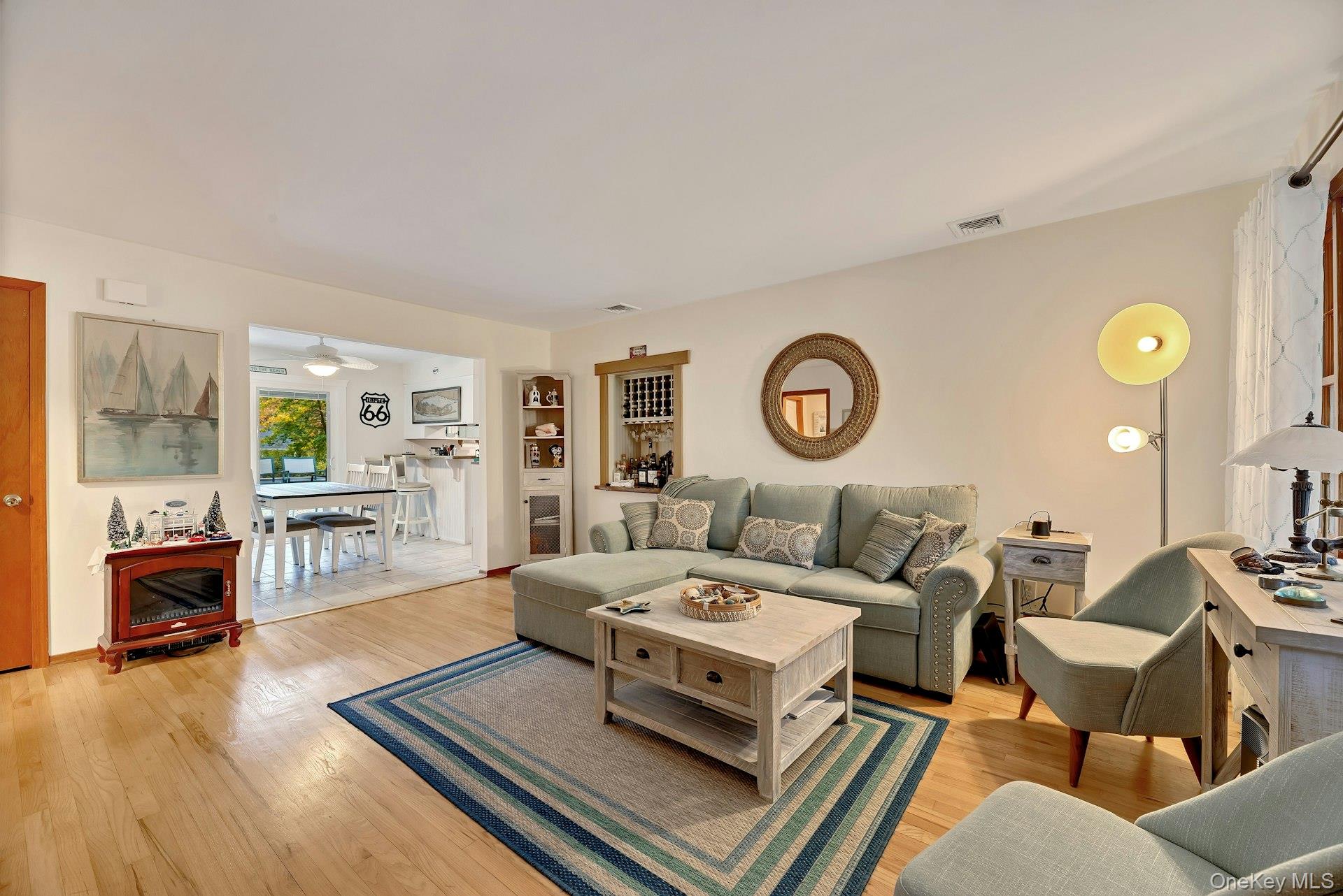 210 3rd Street Laurel, NY 11948 - Photo 4 of 22 Living room with light wood-type flooring