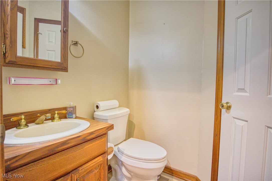 7017 Kirk Road Canfield, OH 44406 - Photo 35 of 35 Bathroom featuring vanity and toilet