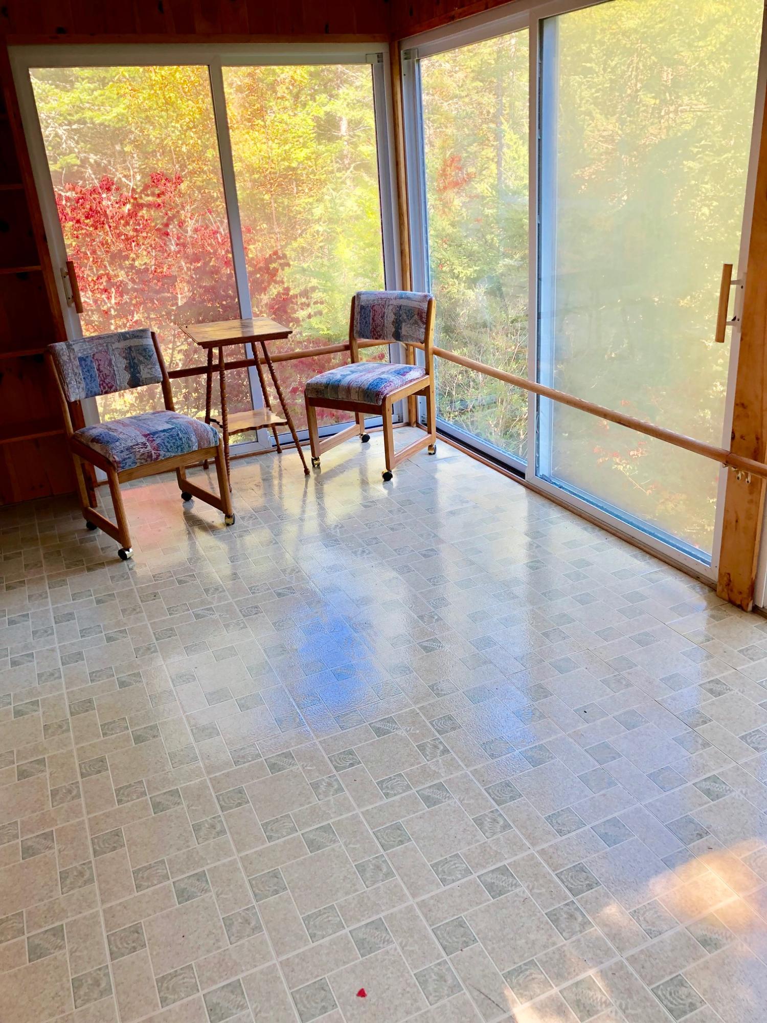 58 Daddy Johnny Road Tremont, ME 04674 - Photo 17 of 52 3 season sunroom facing the pond