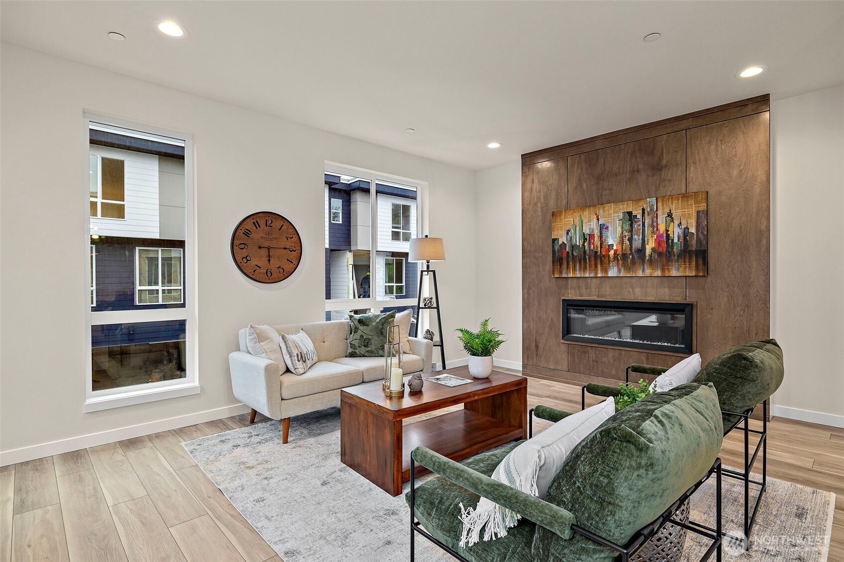 5015 144th Street Southwest, Unit C1 Edmonds, WA 98026 - Photo 19 of 36 a living room with furniture a rug and a fireplace
