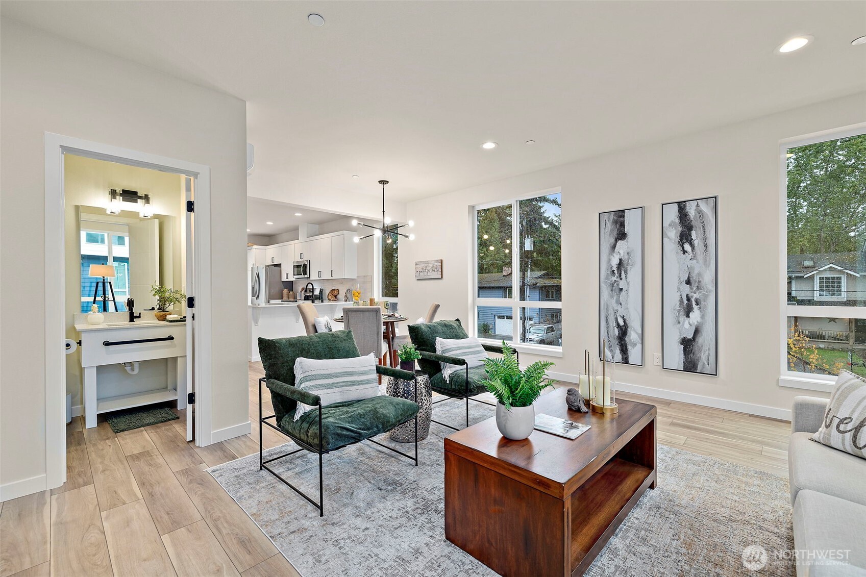 5015 144th Street Southwest, Unit C1 Edmonds, WA 98026 - Photo 21 of 36 a living room with furniture and large windows