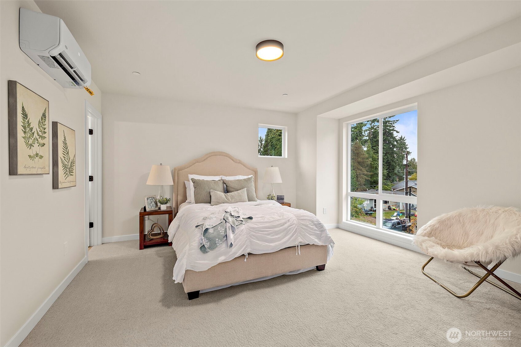 5015 144th Street Southwest, Unit C1 Edmonds, WA 98026 - Photo 28 of 36 a bedroom with a bed and a large window