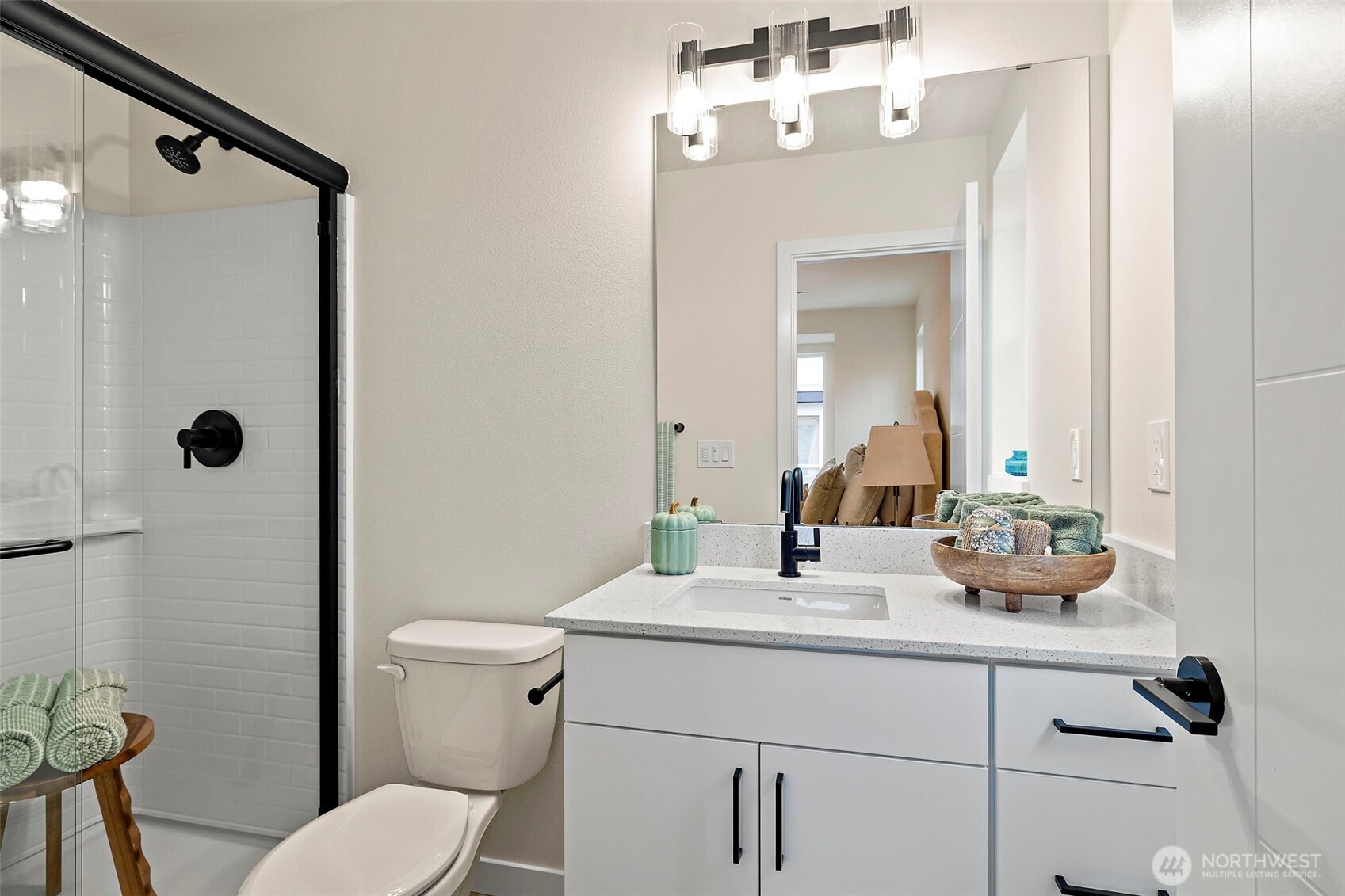 5015 144th Street Southwest, Unit C1 Edmonds, WA 98026 - Photo 31 of 36 a bathroom with a sink vanity mirror and toilet