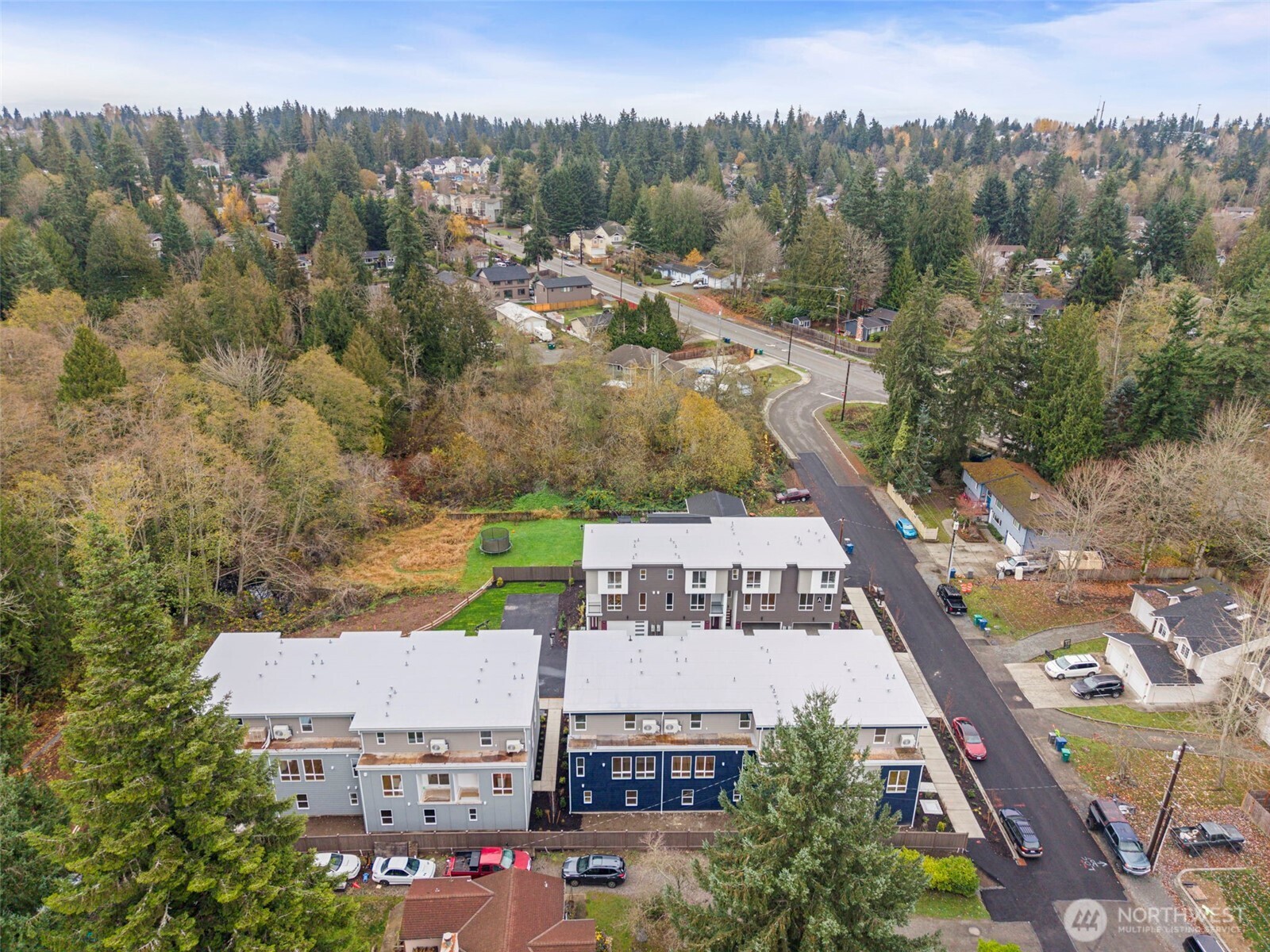 5015 144th Street Southwest, Unit C1 Edmonds, WA 98026 - Photo 36 of 36 an aerial view of residential houses with outdoor space