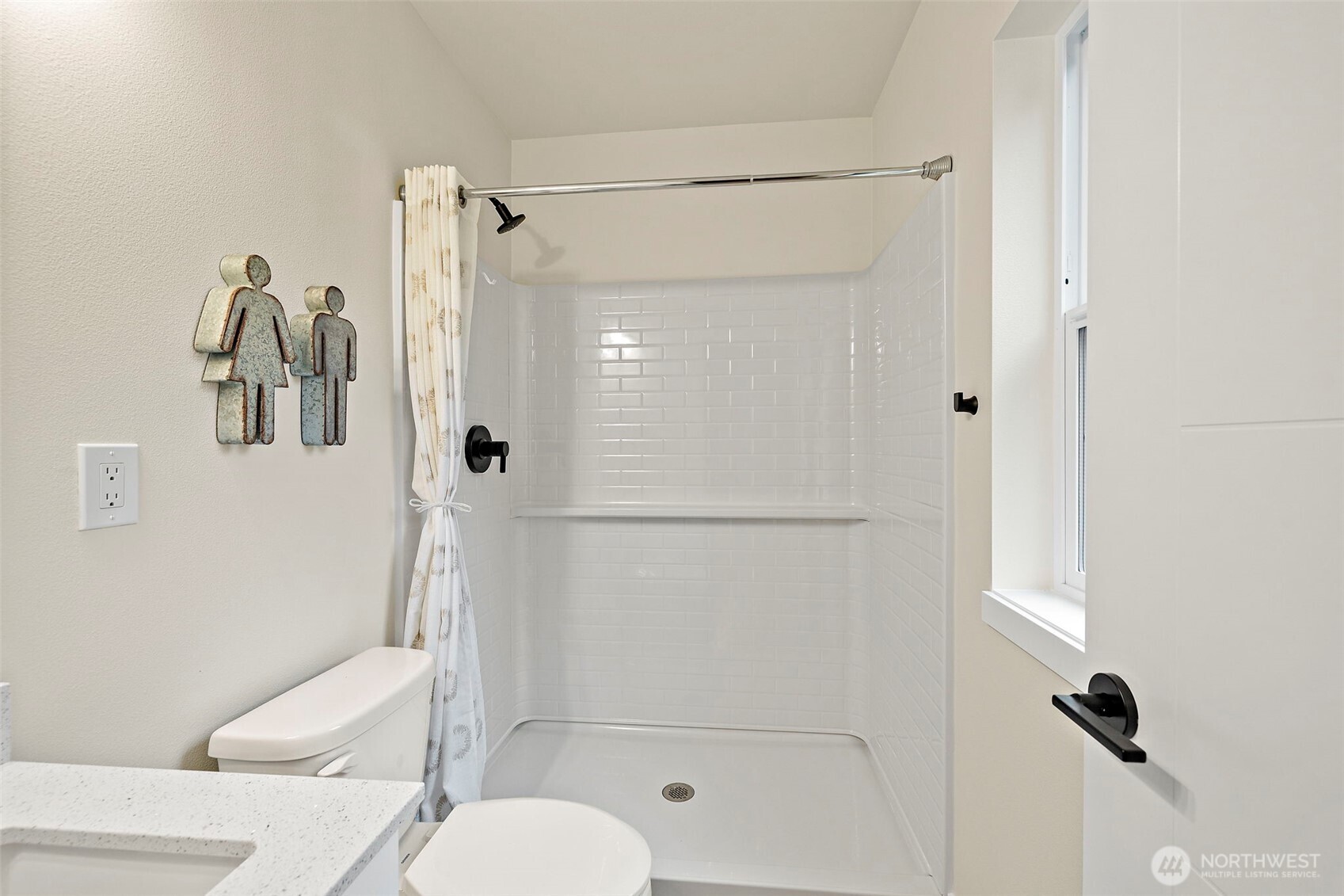 5015 144th Street Southwest, Unit C1 Edmonds, WA 98026 - Photo 8 of 36 a bathroom with a toilet and a shower