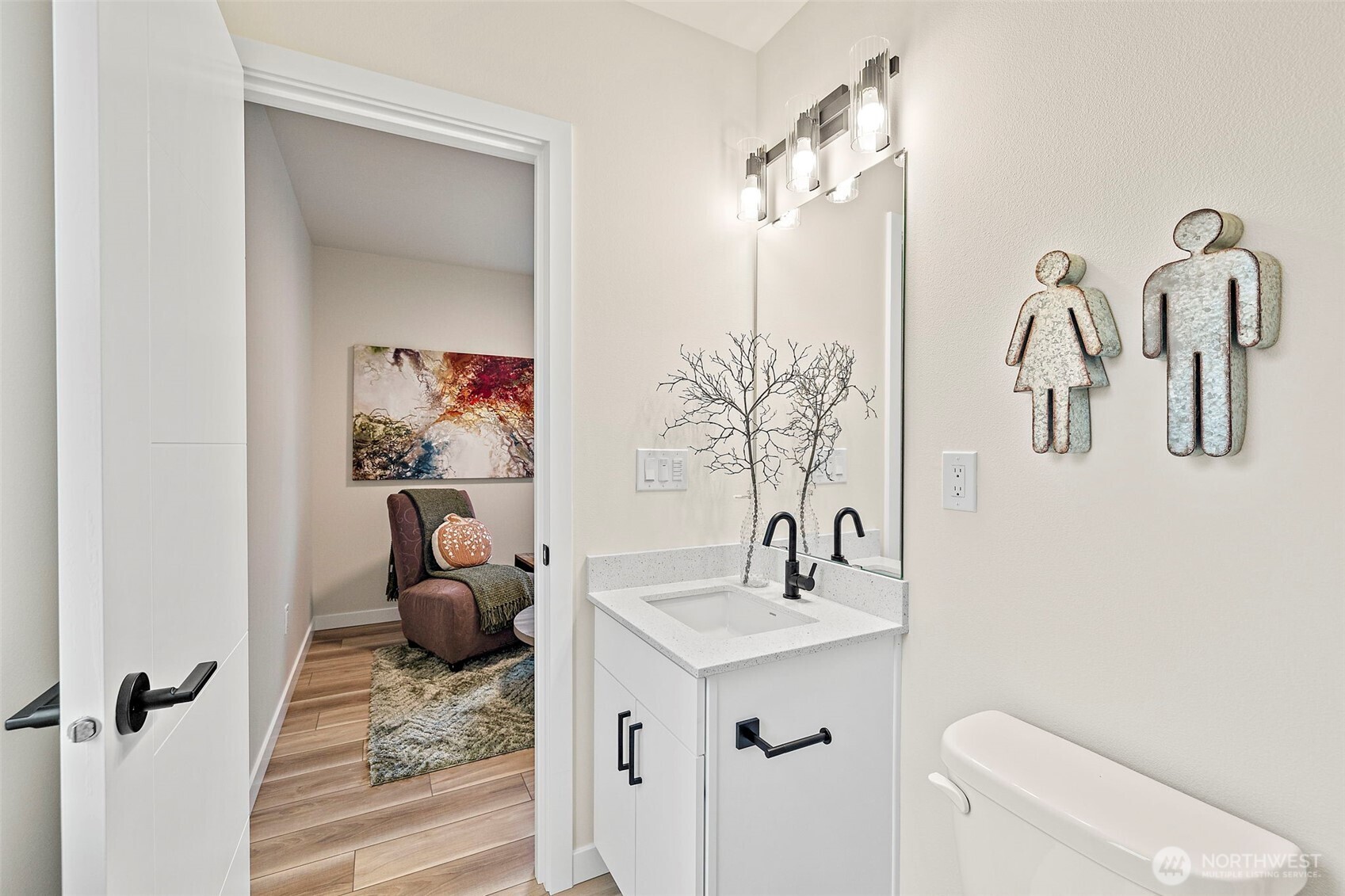 5015 144th Street Southwest, Unit C1 Edmonds, WA 98026 - Photo 9 of 36 a bathroom with a sink mirror and toilet